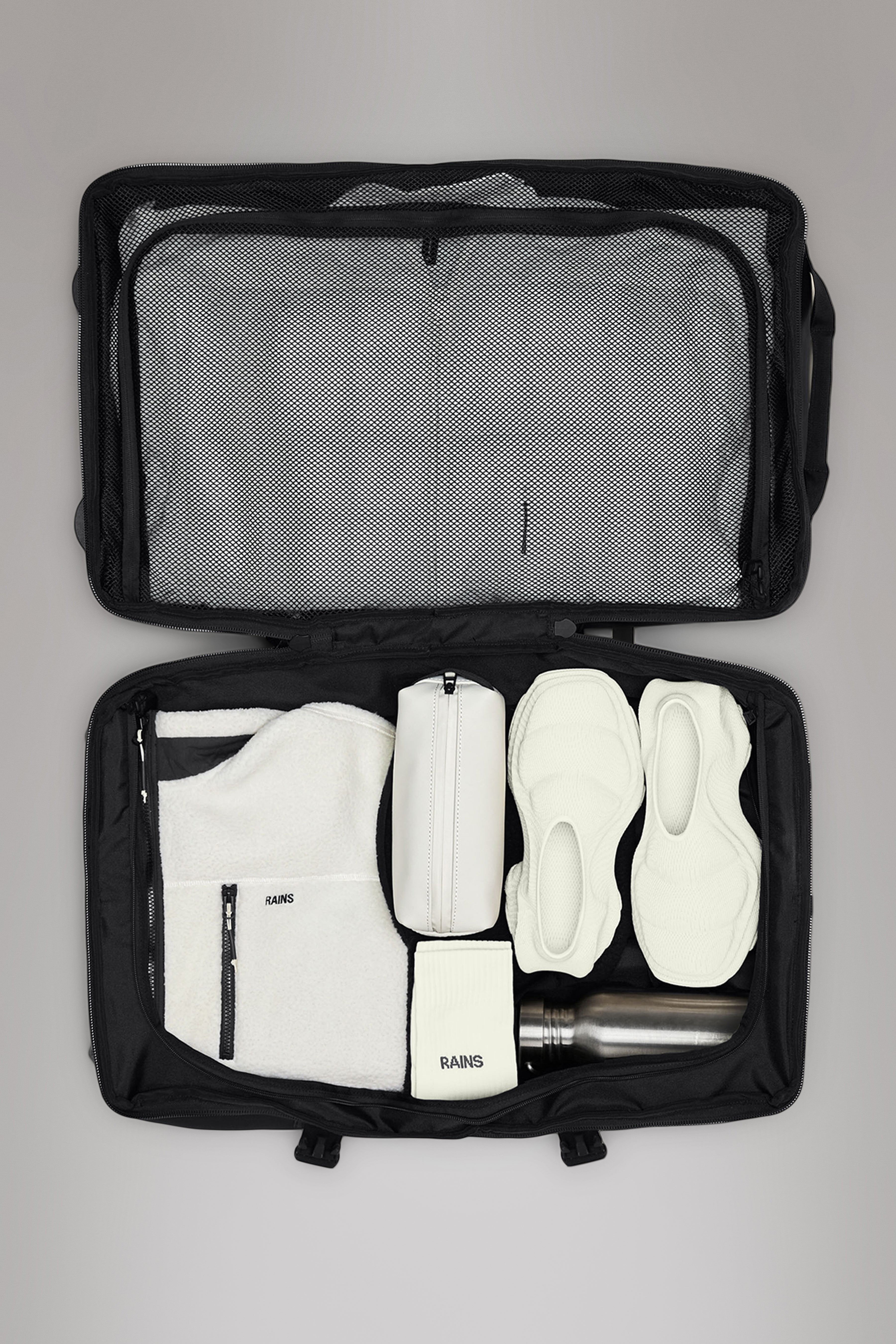 RAINS Texel Check-in Bag Black 62L H66 x D29 x W40 cm Trolley